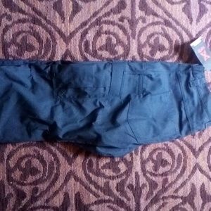 Seven pair of men's cargo/security or work pants